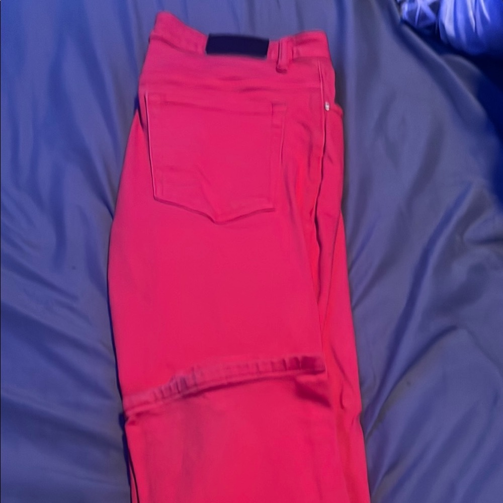 RED STACKED JEANS.. WORN TWICE..